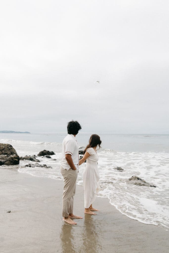 A morning engagement session on a beach in Malibu, CA