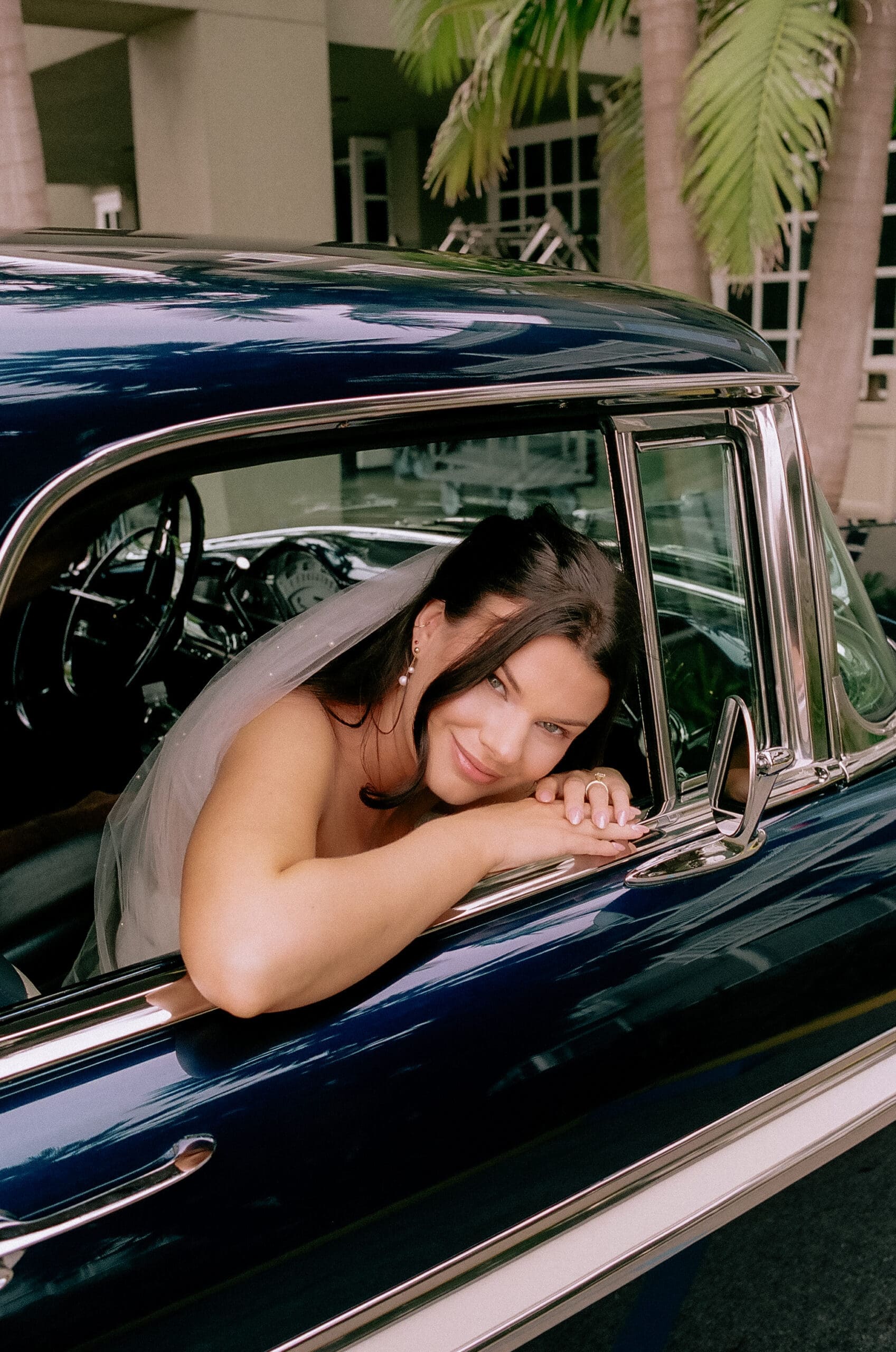 Bride in vintage car on film | New York City Elopement Photographer